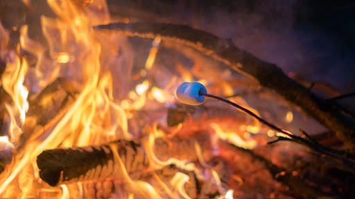 roasting marshmallow on a fire pit